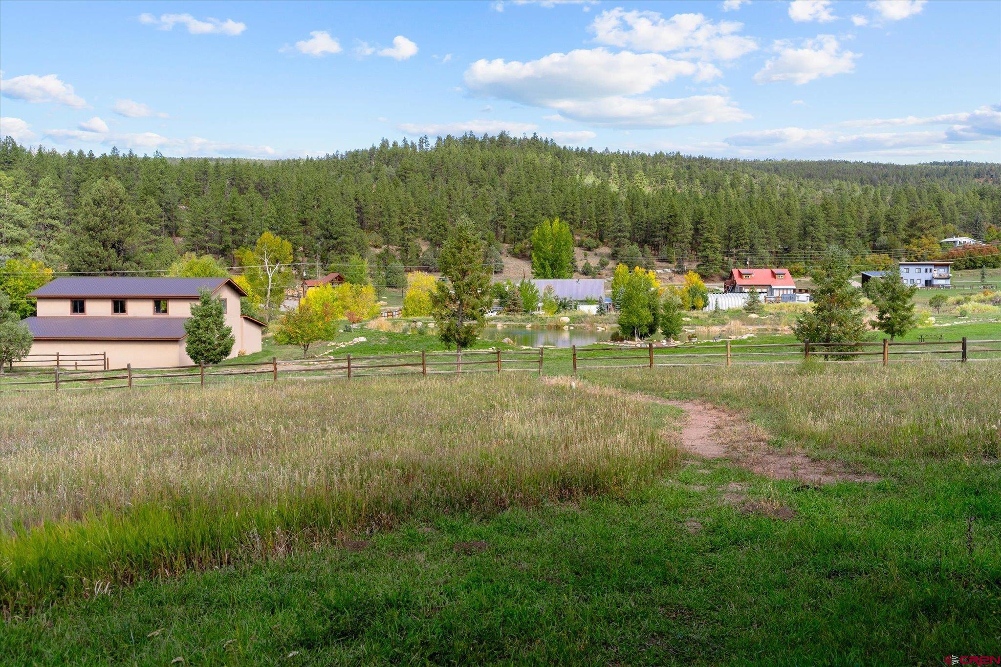 73 Ute Pass Road Durango, CO 81301 - Photo 37 of 44 a view of a golf course with a lake view