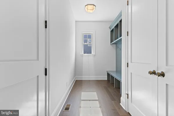 a view of a hallway with closet