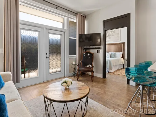 a living room with furniture and a window
