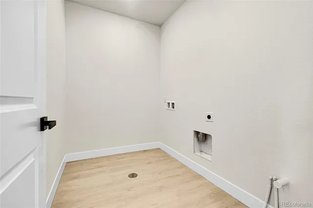 a bedroom with bed and a window