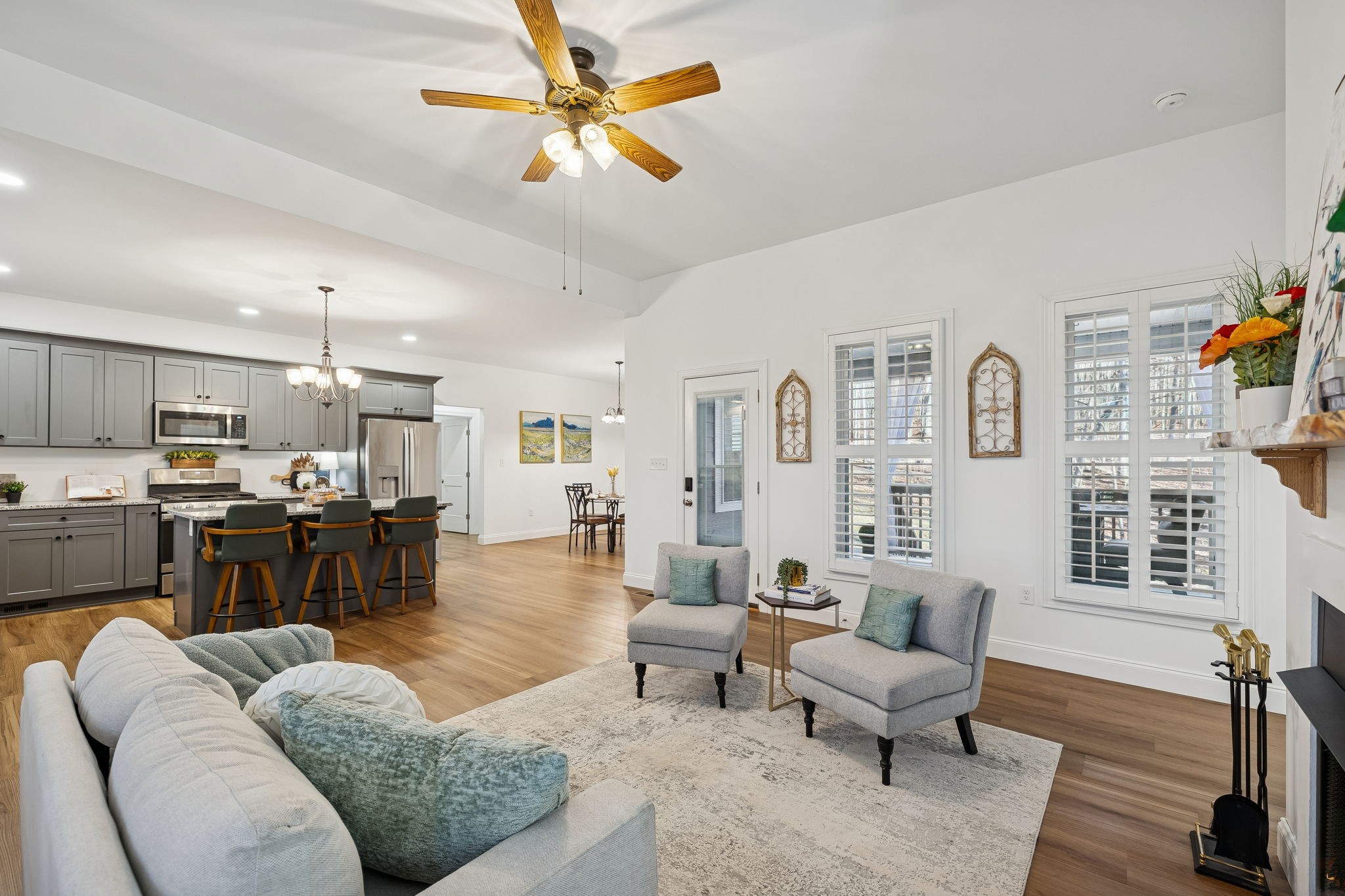 261 Lake Louisa Loop Monteagle, TN 37356 - Photo 15 of 49 a living room with furniture kitchen view and a large window