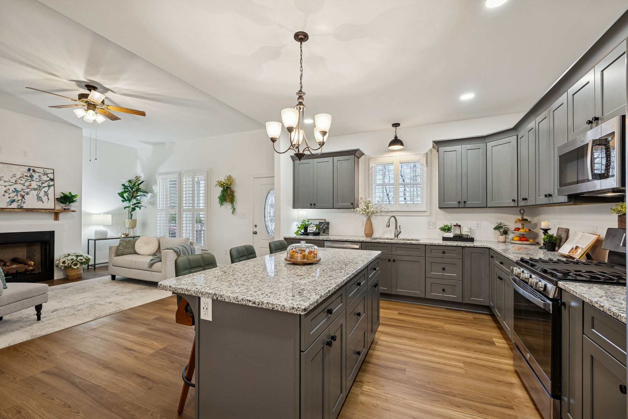261 Lake Louisa Loop Monteagle, TN 37356 - Photo 17 of 49 a kitchen with sink refrigerator and cabinets