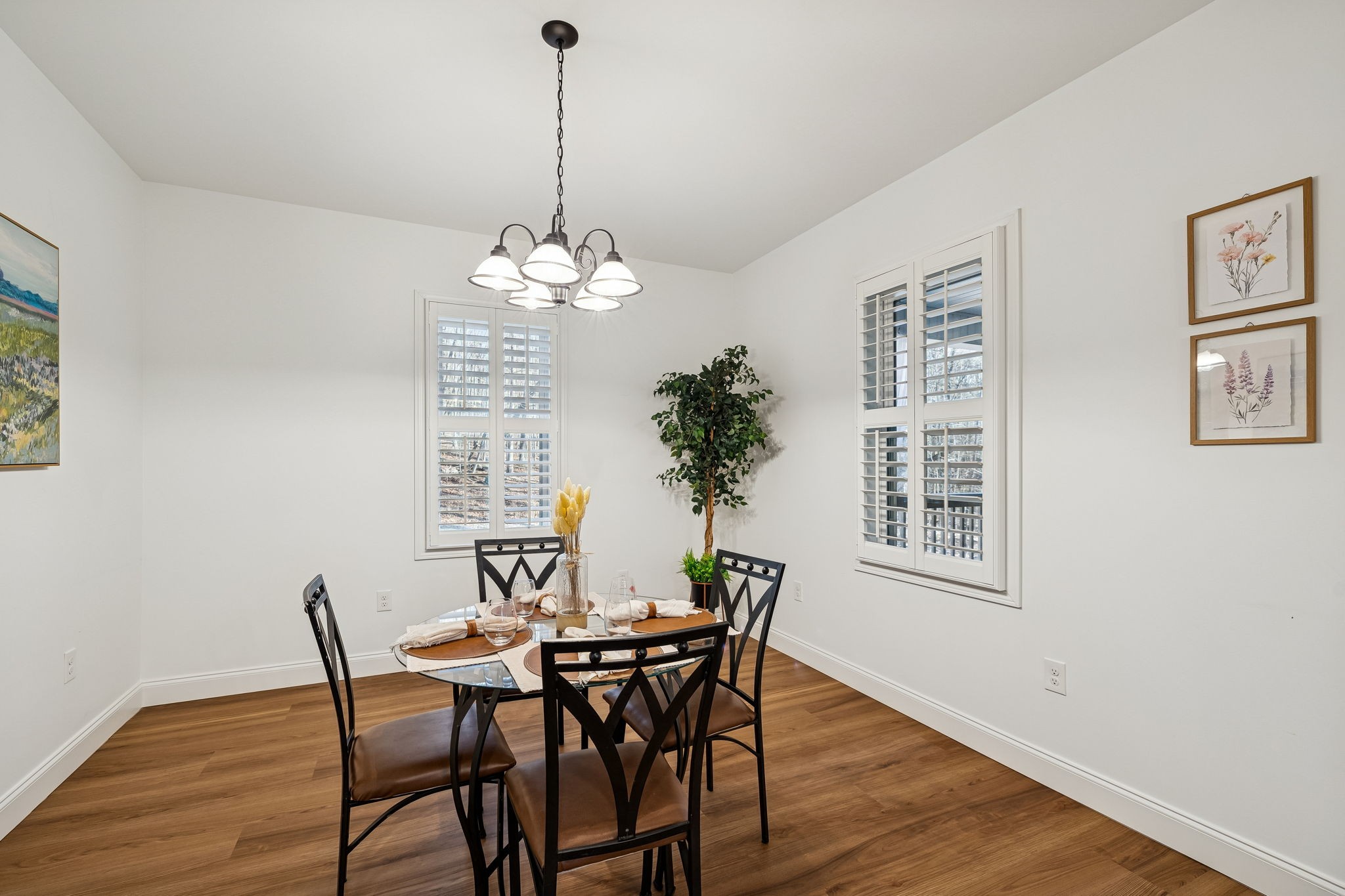 261 Lake Louisa Loop Monteagle, TN 37356 - Photo 20 of 49 a view of a dining room with furniture wooden floor and a chandelier