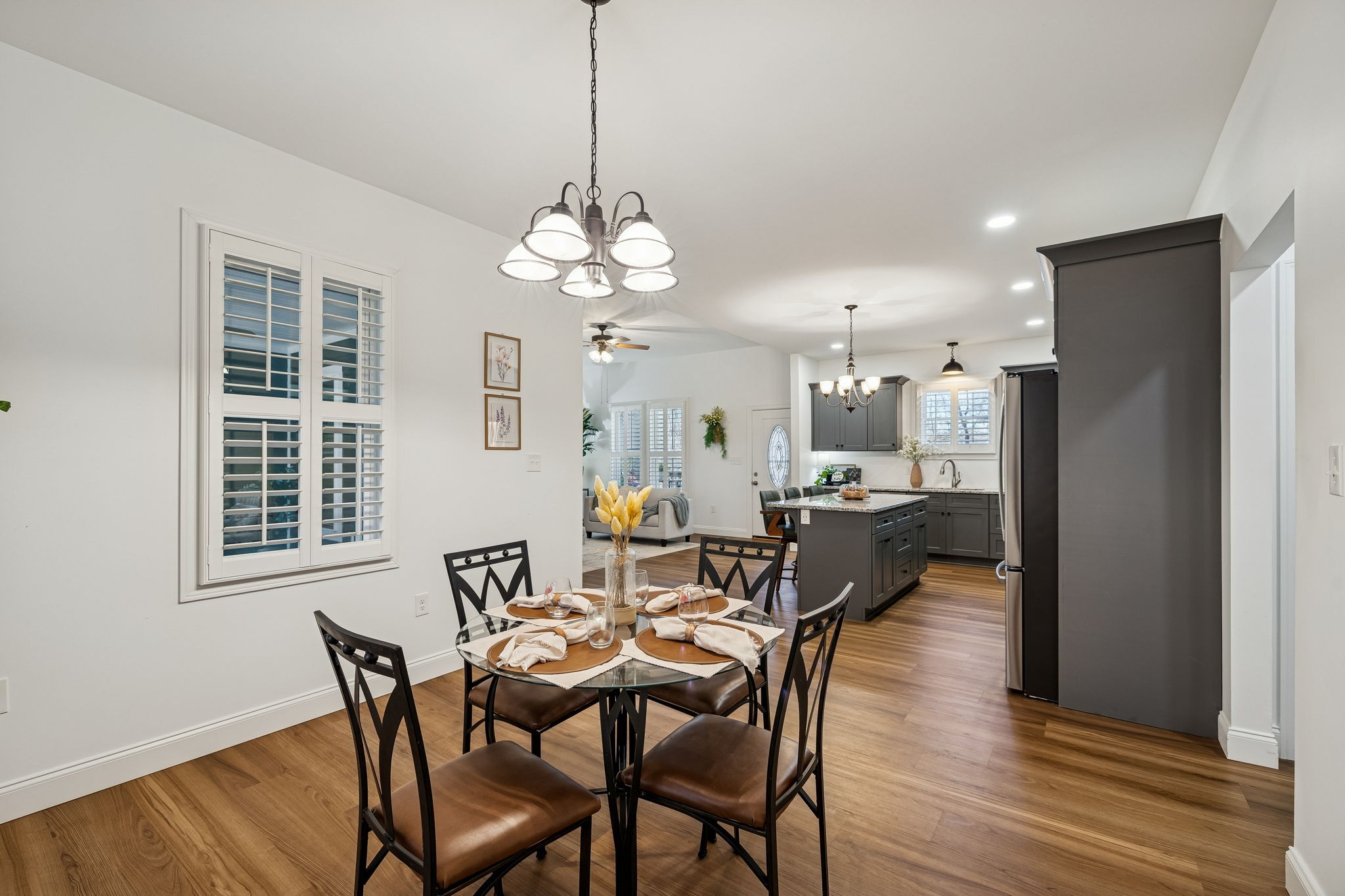 261 Lake Louisa Loop Monteagle, TN 37356 - Photo 21 of 49 a view of a dining room with furniture wooden floor and chandelier