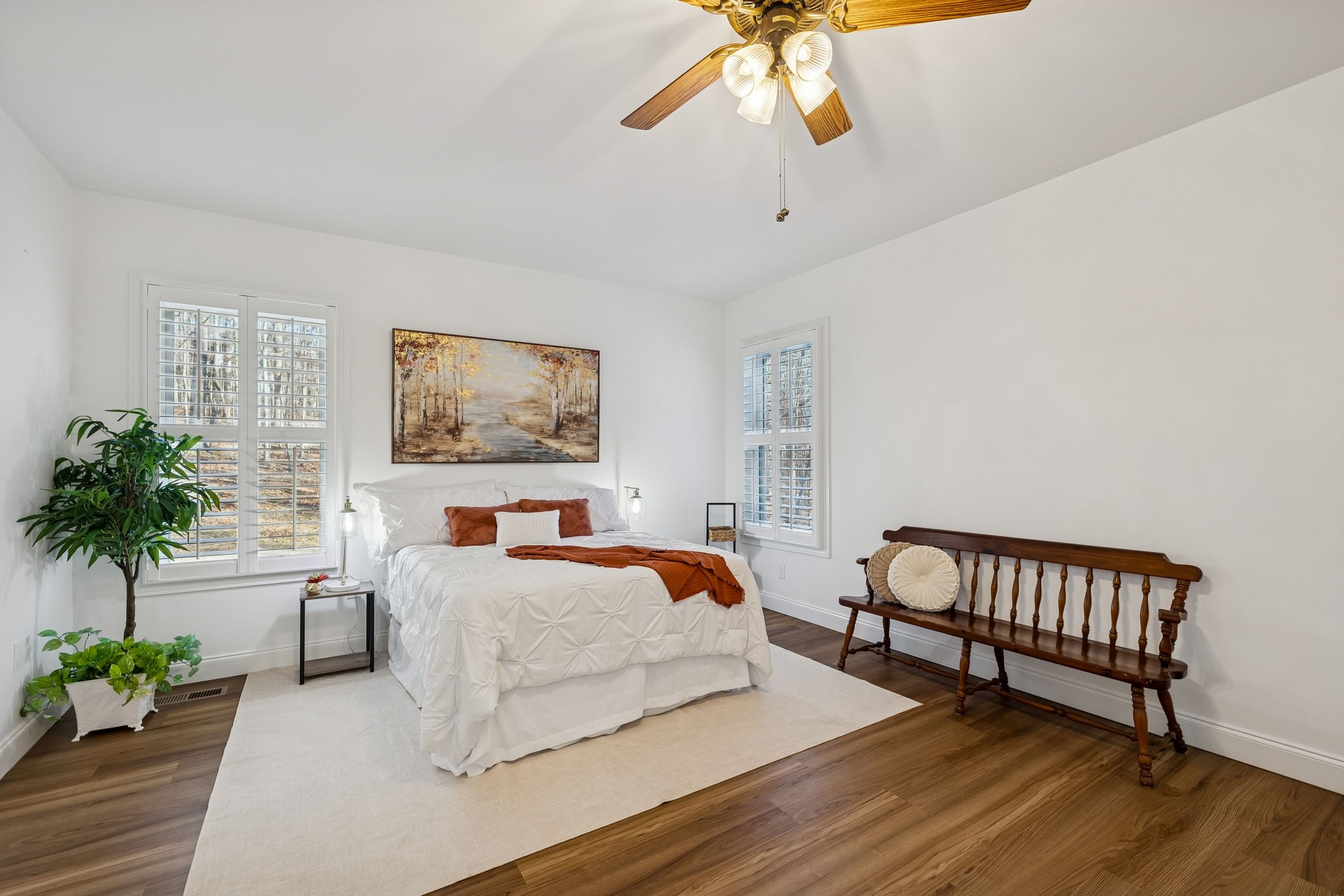 261 Lake Louisa Loop Monteagle, TN 37356 - Photo 22 of 49 a bedroom with a bed and a chandelier