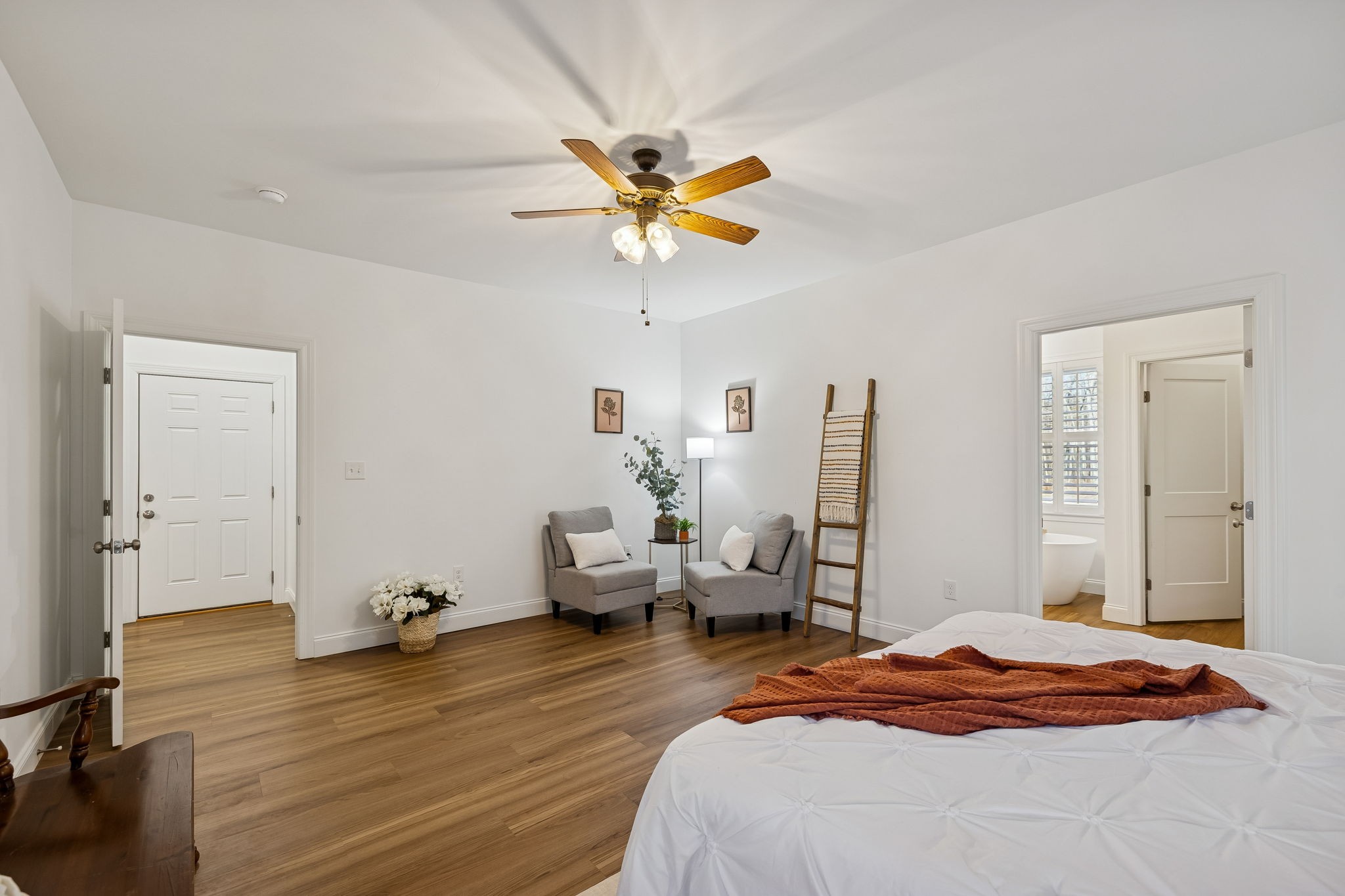 261 Lake Louisa Loop Monteagle, TN 37356 - Photo 23 of 49 a bedroom with a bed and wooden floor