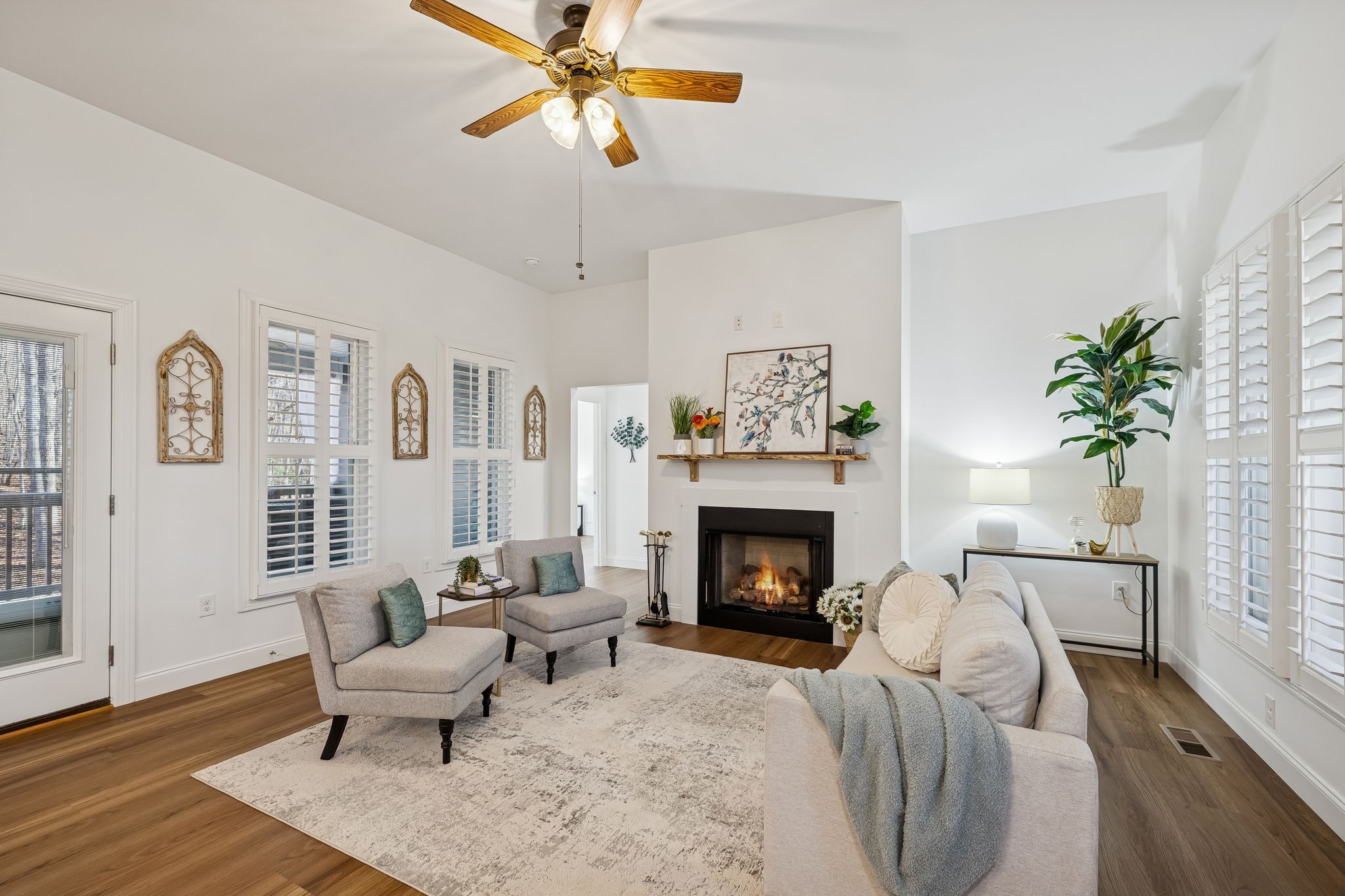 261 Lake Louisa Loop Monteagle, TN 37356 - Photo 3 of 49 a living room with furniture and a fireplace