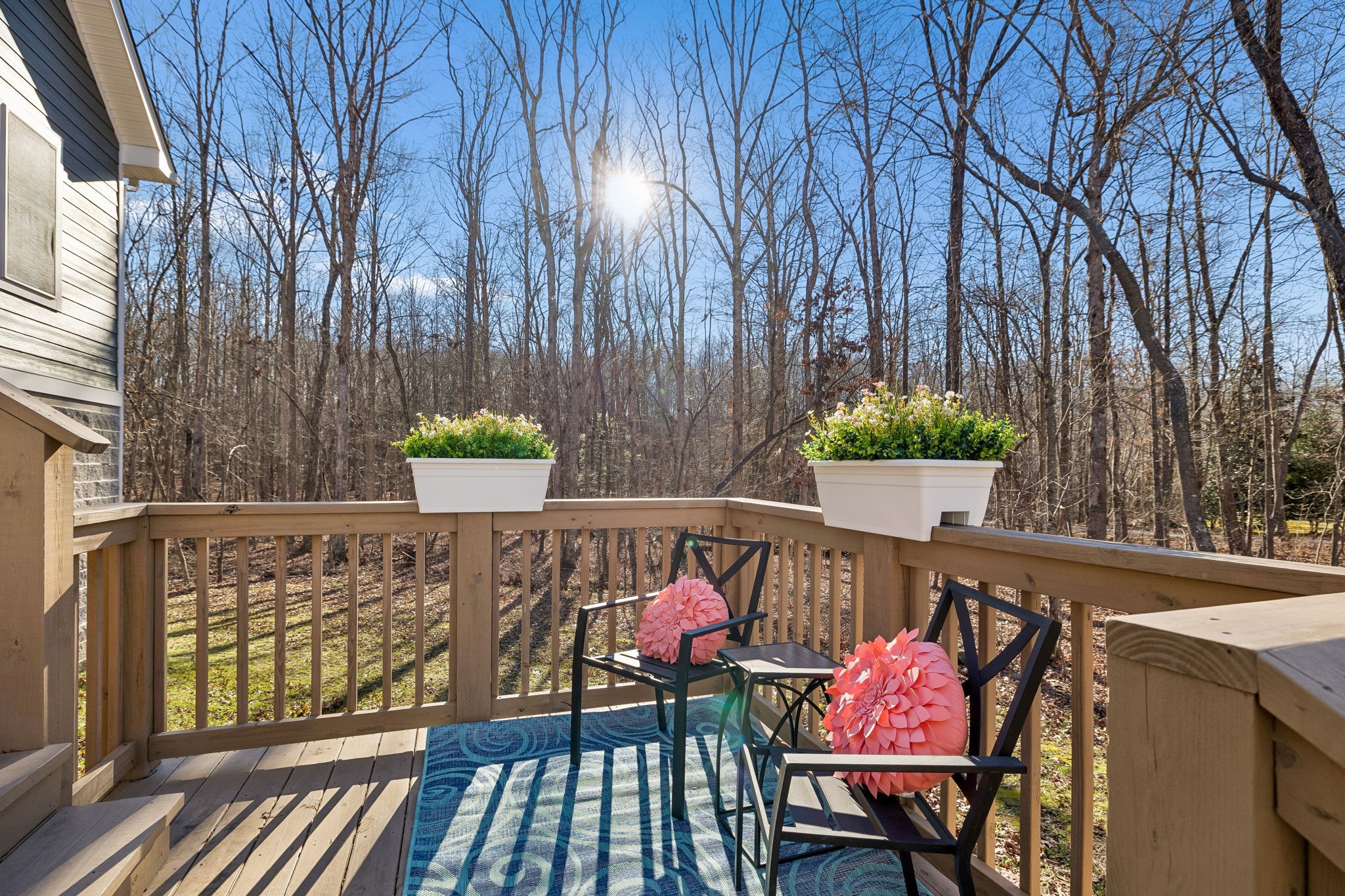 261 Lake Louisa Loop Monteagle, TN 37356 - Photo 8 of 49 an outdoor sitting area with furniture and wooden floor