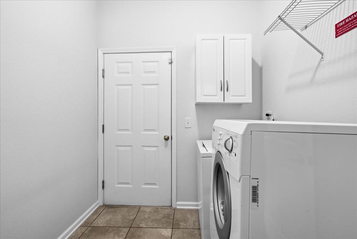 1112 Golden Lake Loop St. Augustine, FL 32084 - Photo 12 of 56 a view of a storage and utility room with a washer dryer