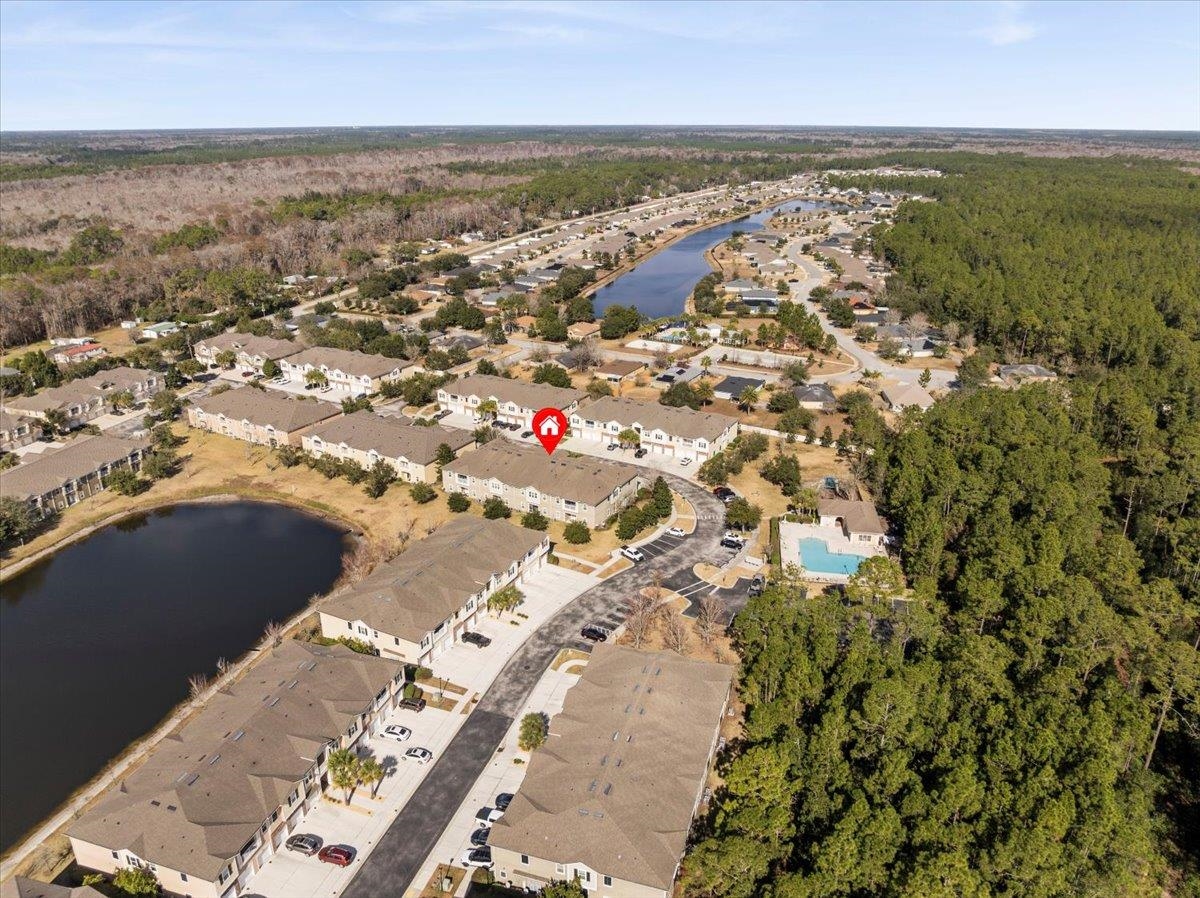 1112 Golden Lake Loop St. Augustine, FL 32084 - Photo 41 of 56 an aerial view of residential building with parking space