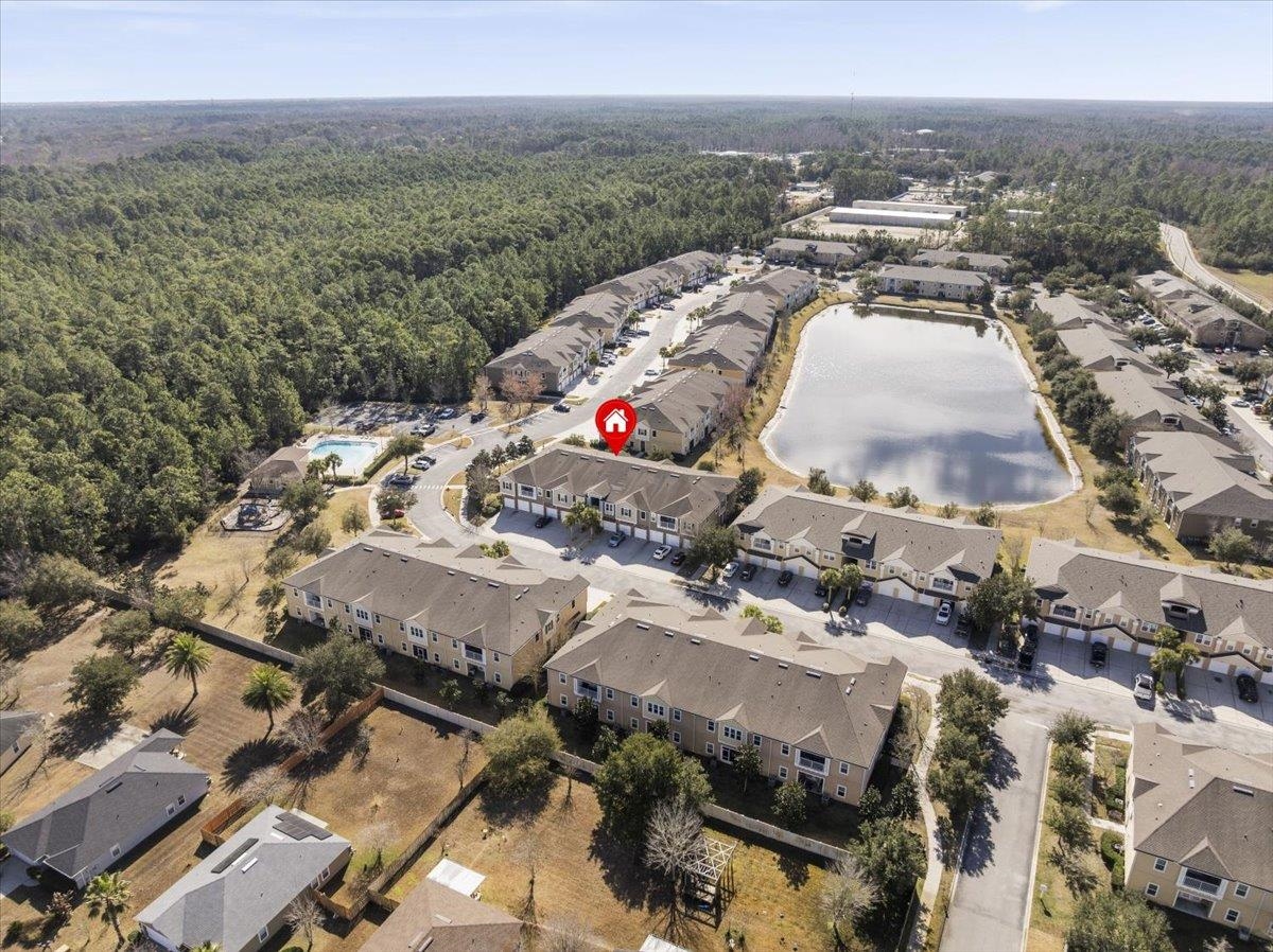 1112 Golden Lake Loop St. Augustine, FL 32084 - Photo 42 of 56 an aerial view of a building with an outdoor space