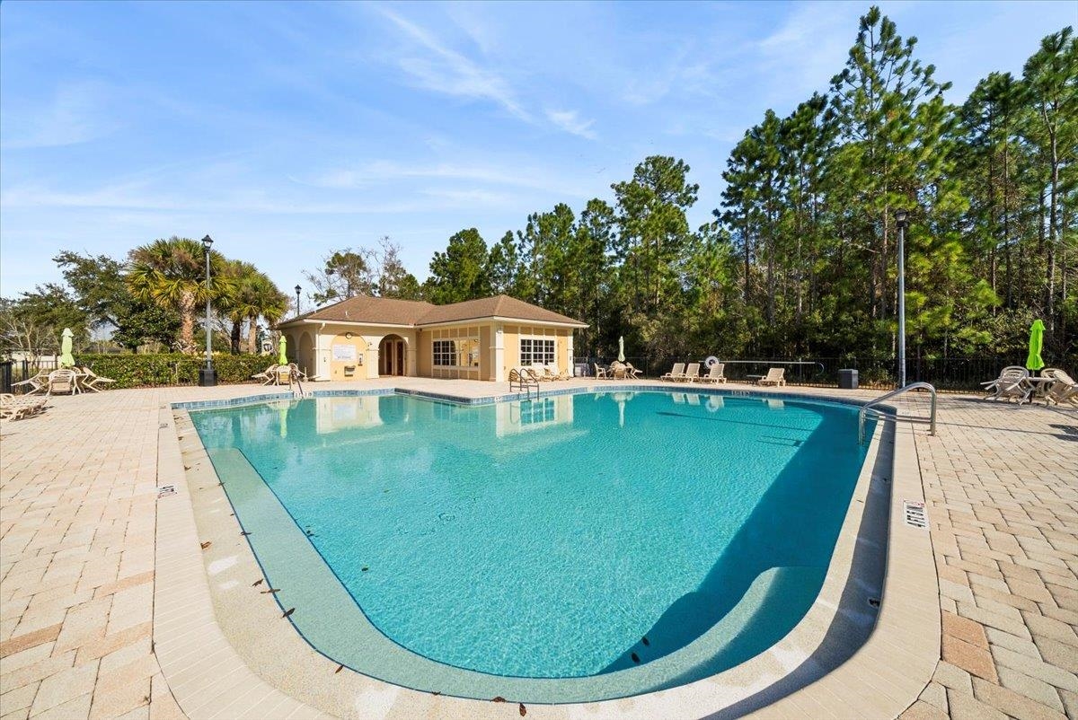 1112 Golden Lake Loop St. Augustine, FL 32084 - Photo 48 of 56 a view of a house with swimming pool