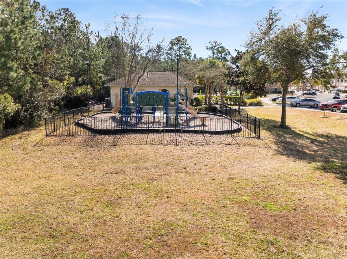 1112 Golden Lake Loop St. Augustine, FL 32084 - Photo 50 of 56 a view of a swimming pool with an outdoor seating
