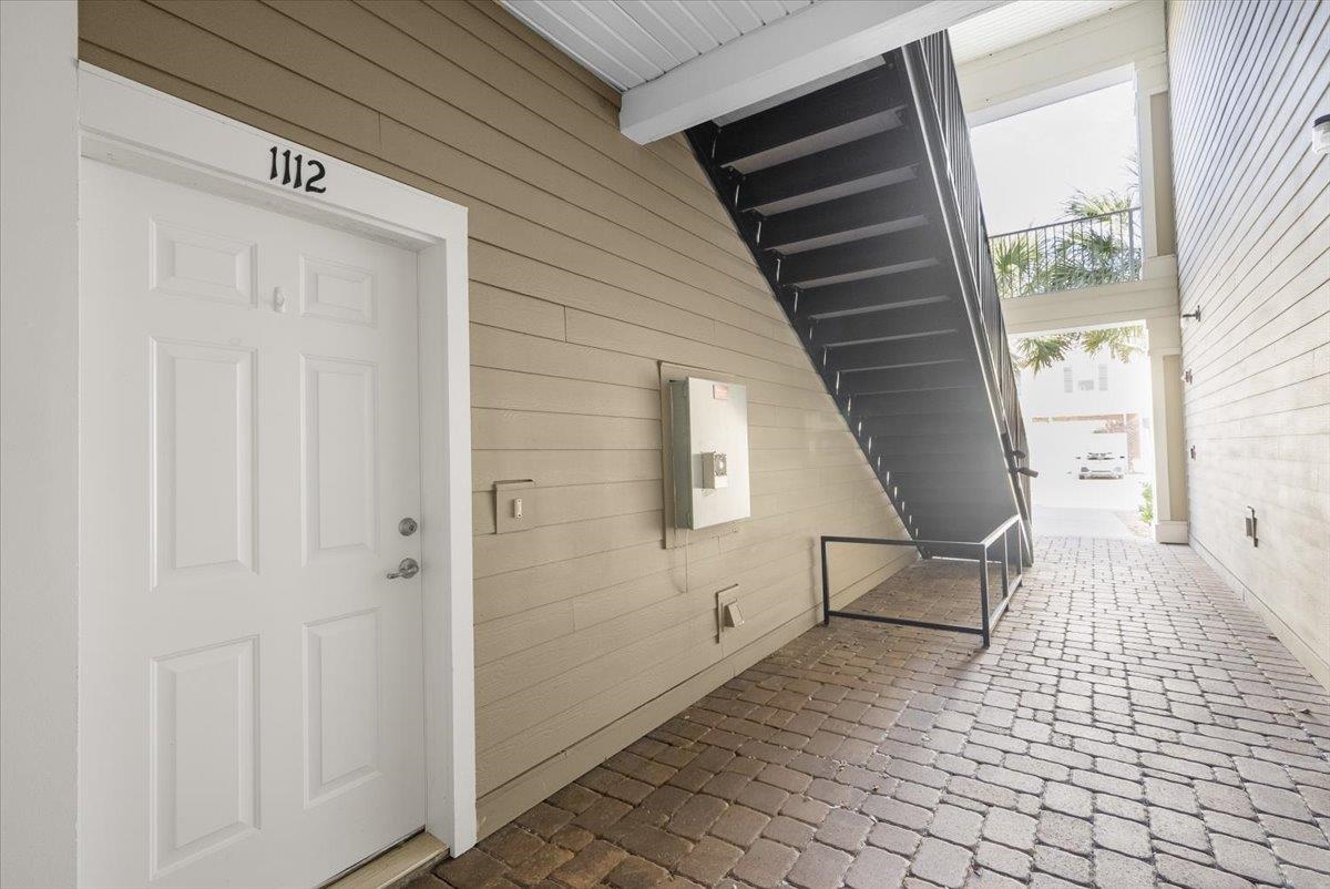1112 Golden Lake Loop St. Augustine, FL 32084 - Photo 8 of 56 a view of a porch with wooden floor and stairs