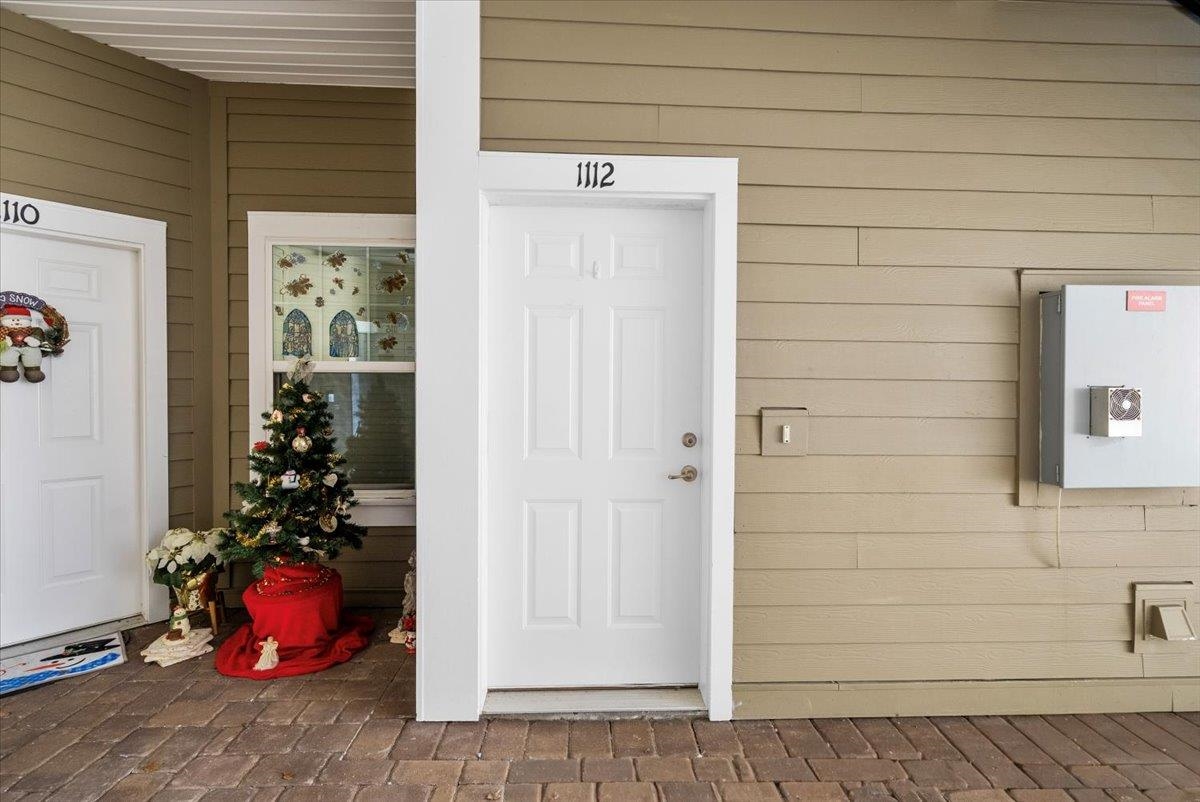 1112 Golden Lake Loop St. Augustine, FL 32084 - Photo 9 of 56 a view of a entryway door of the house