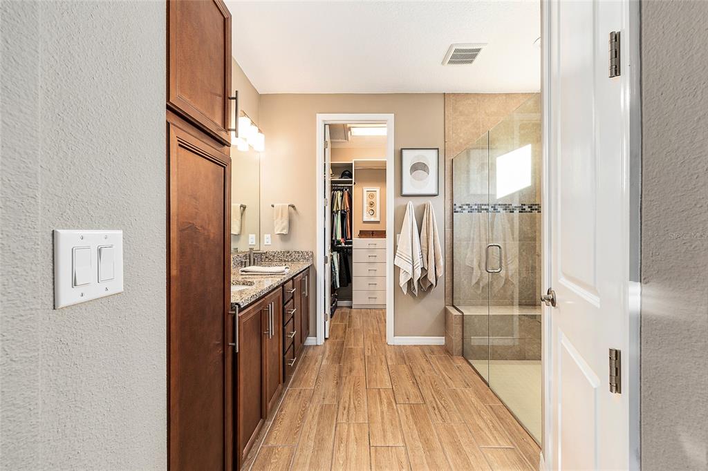 5589 Northwest 40th Loop Ocala, FL 34482 - Photo 26 of 47 a bathroom with a sink and a mirror