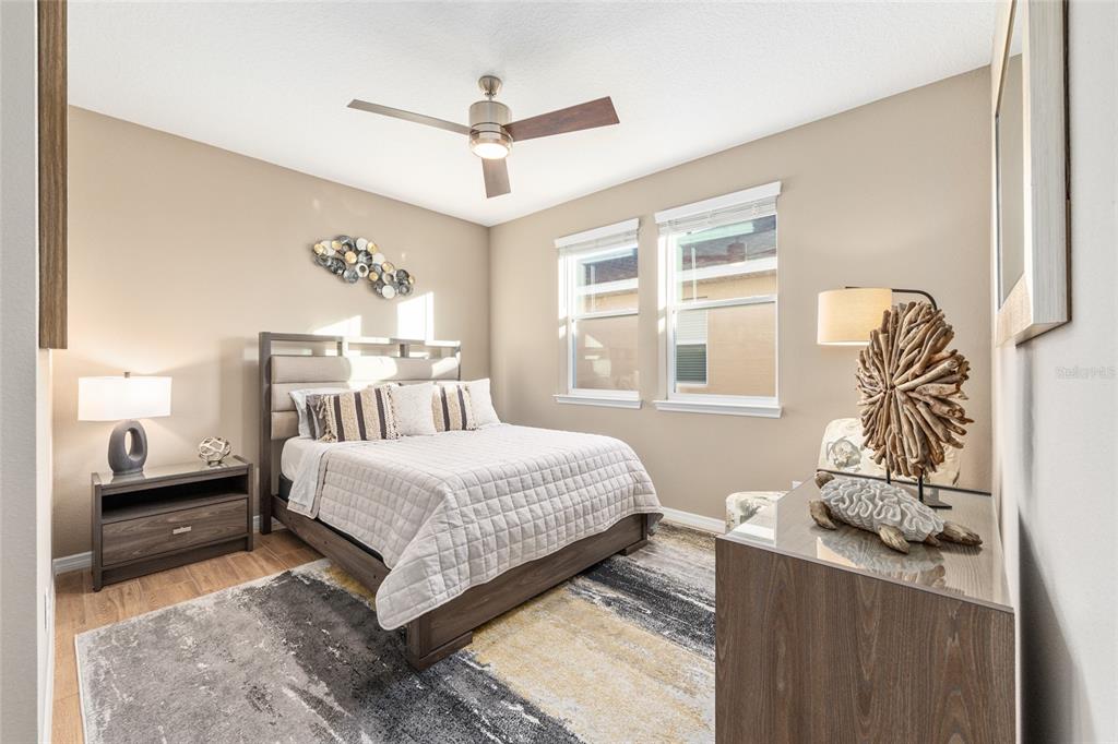 5589 Northwest 40th Loop Ocala, FL 34482 - Photo 31 of 47 a bedroom with a bed and a window