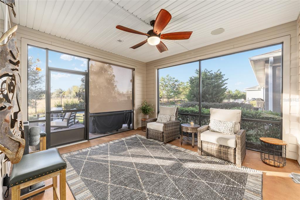 5589 Northwest 40th Loop Ocala, FL 34482 - Photo 34 of 47 a living room with furniture and a large window