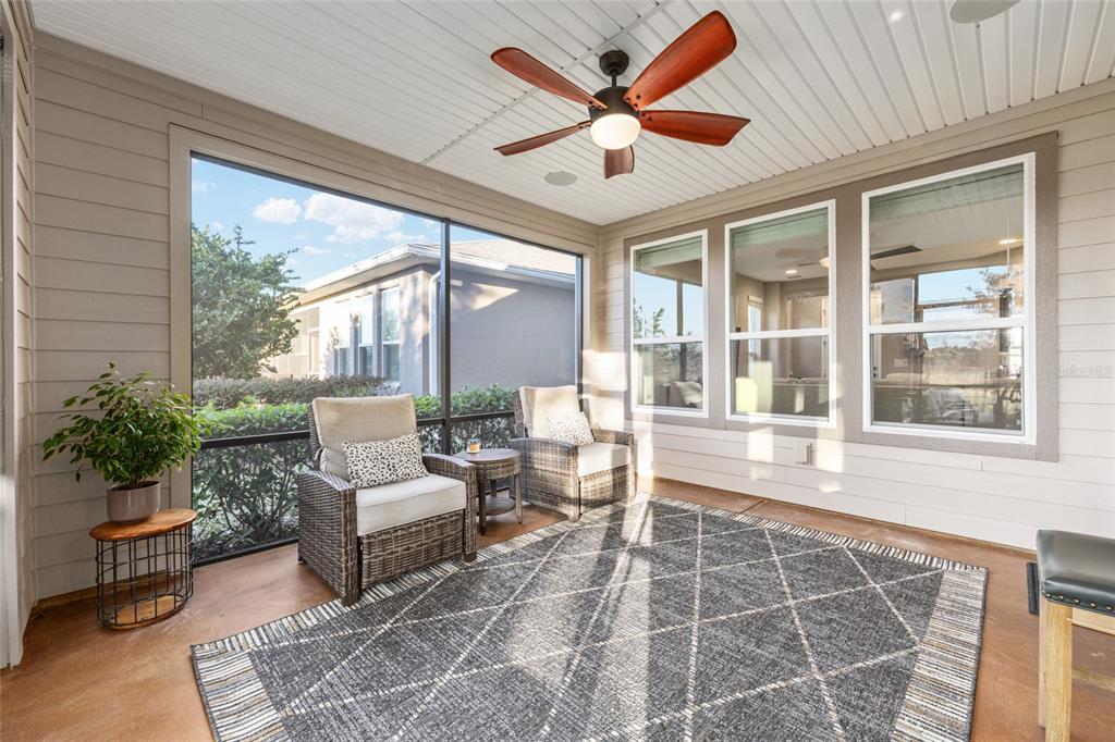 5589 Northwest 40th Loop Ocala, FL 34482 - Photo 36 of 47 a living room with furniture and a large window