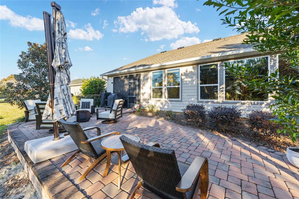 5589 Northwest 40th Loop Ocala, FL 34482 - Photo 39 of 47 a view of backyard with outdoor seating and city view