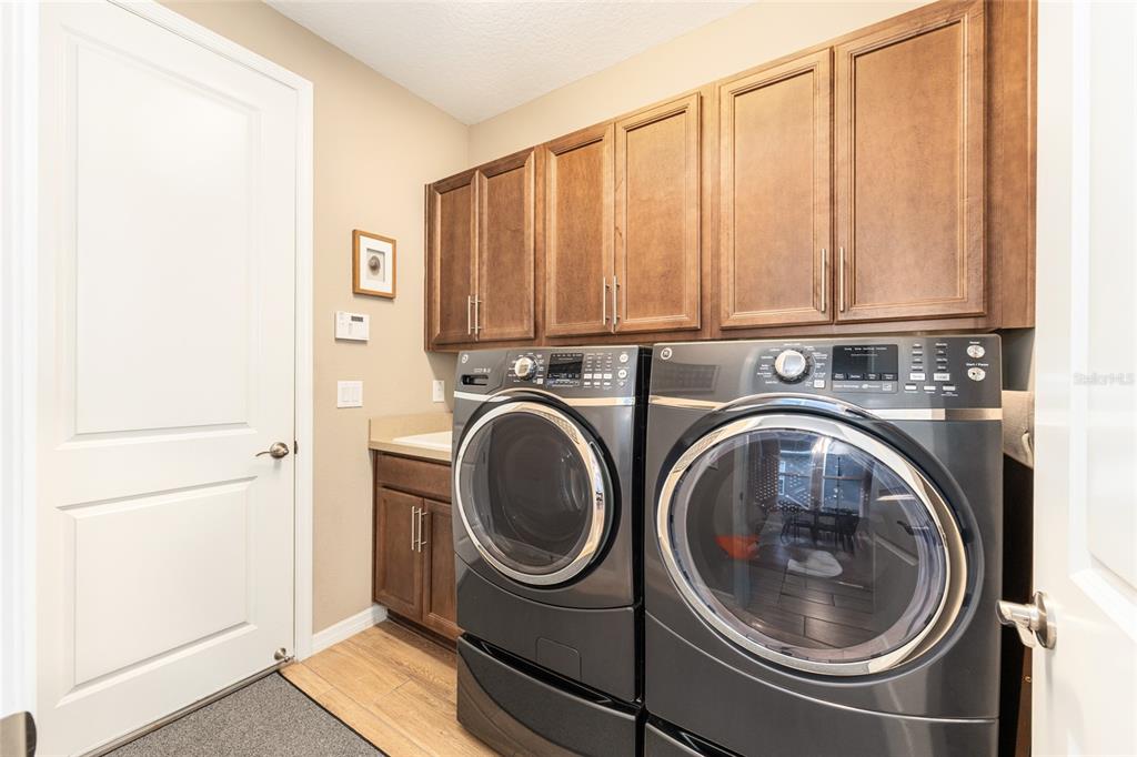 5589 Northwest 40th Loop Ocala, FL 34482 - Photo 44 of 47 a utility room with dryer and washer