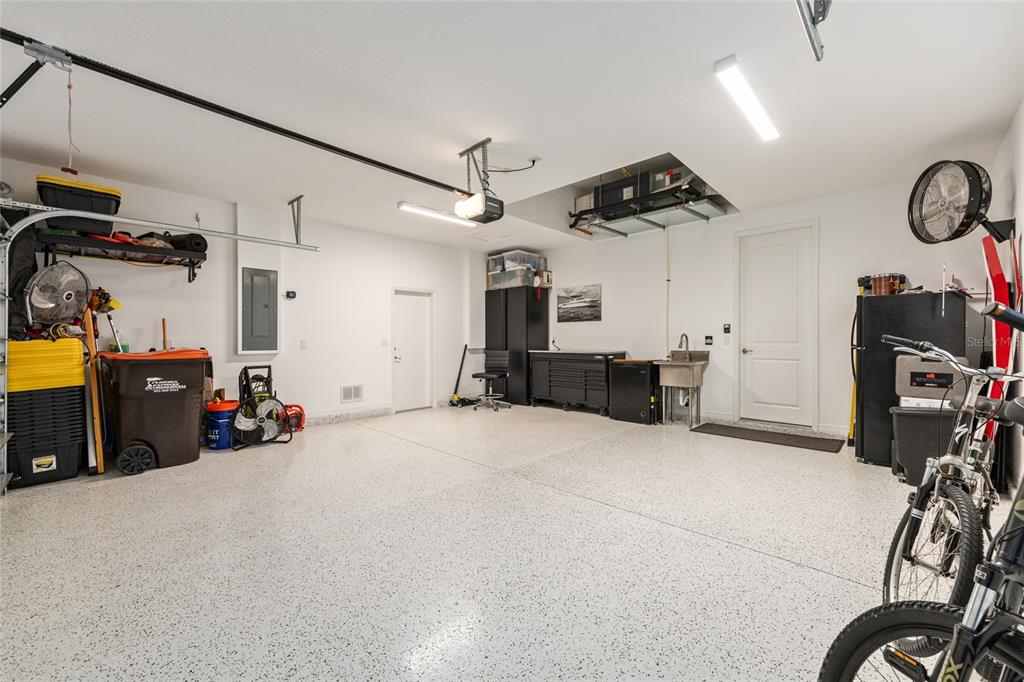 5589 Northwest 40th Loop Ocala, FL 34482 - Photo 45 of 47 a view of a garage with furniture