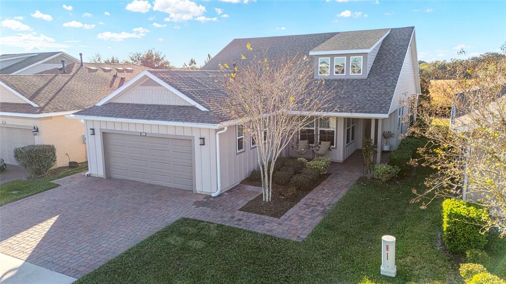 5589 Northwest 40th Loop Ocala, FL 34482 - Photo 46 of 47 a view of a house with a yard
