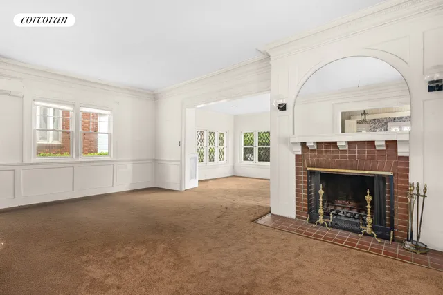 a view of a big room with windows