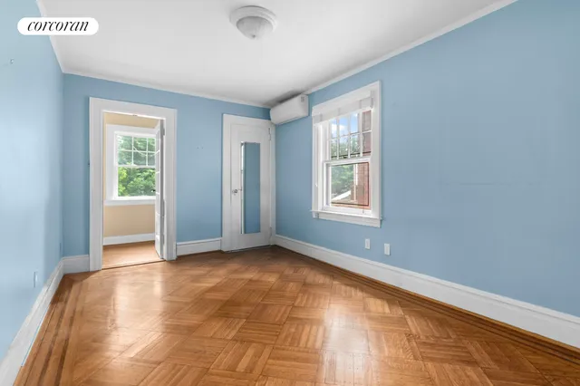 a view of an empty room with a window