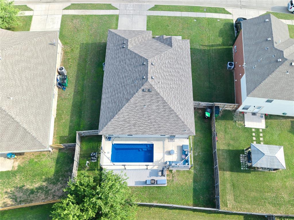 12724 Carpenter Lane Rhome, TX 76078 - Photo 34 of 37 Aerial perspective showcasing a property with a private pool and spacious backyard