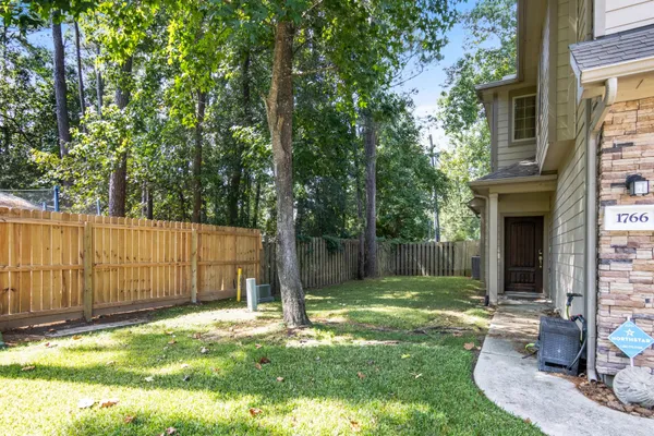 a view of a backyard with a small cabin