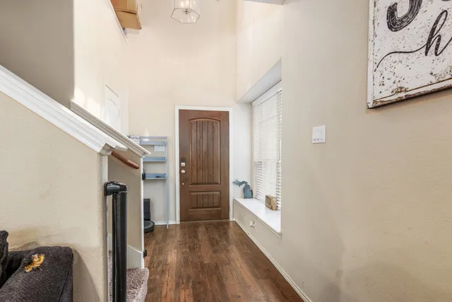 a view of entryway with wooden floor