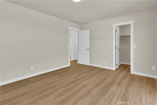 a bathroom with a sink mirror toilet and a mirror