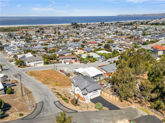 a view of a house with a ocean view