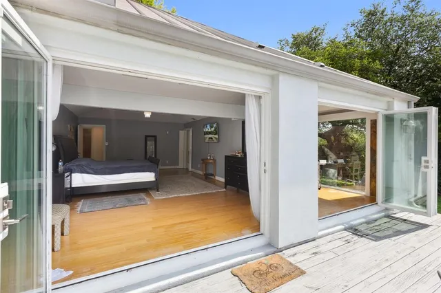 a room with furniture and a flat screen tv