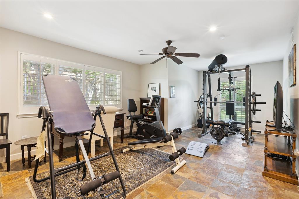 6160 Spring Valley Road Dallas, TX 75240 - Photo 15 of 40 a view of a room with gym equipment