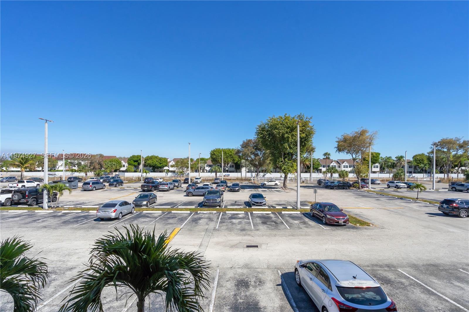 17530 Northwest 68th Avenue, Unit C2003 Hialeah, FL 33015 - Photo 20 of 20 a view of a terrace with seating area