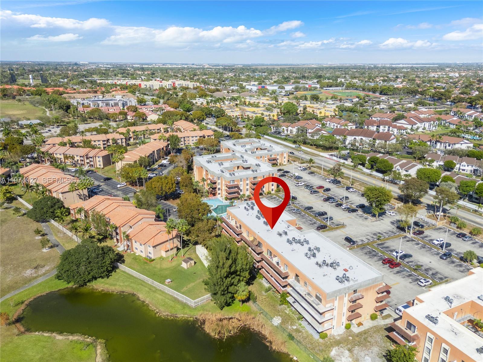 17530 Northwest 68th Avenue, Unit C2003 Hialeah, FL 33015 - Photo 3 of 20 a view of a city with ocean view