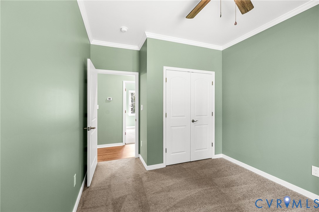 2211 Osborne Road Chester, VA 23831 - Photo 10 of 42 Carpeted flooring, double closet doors, ceiling fa