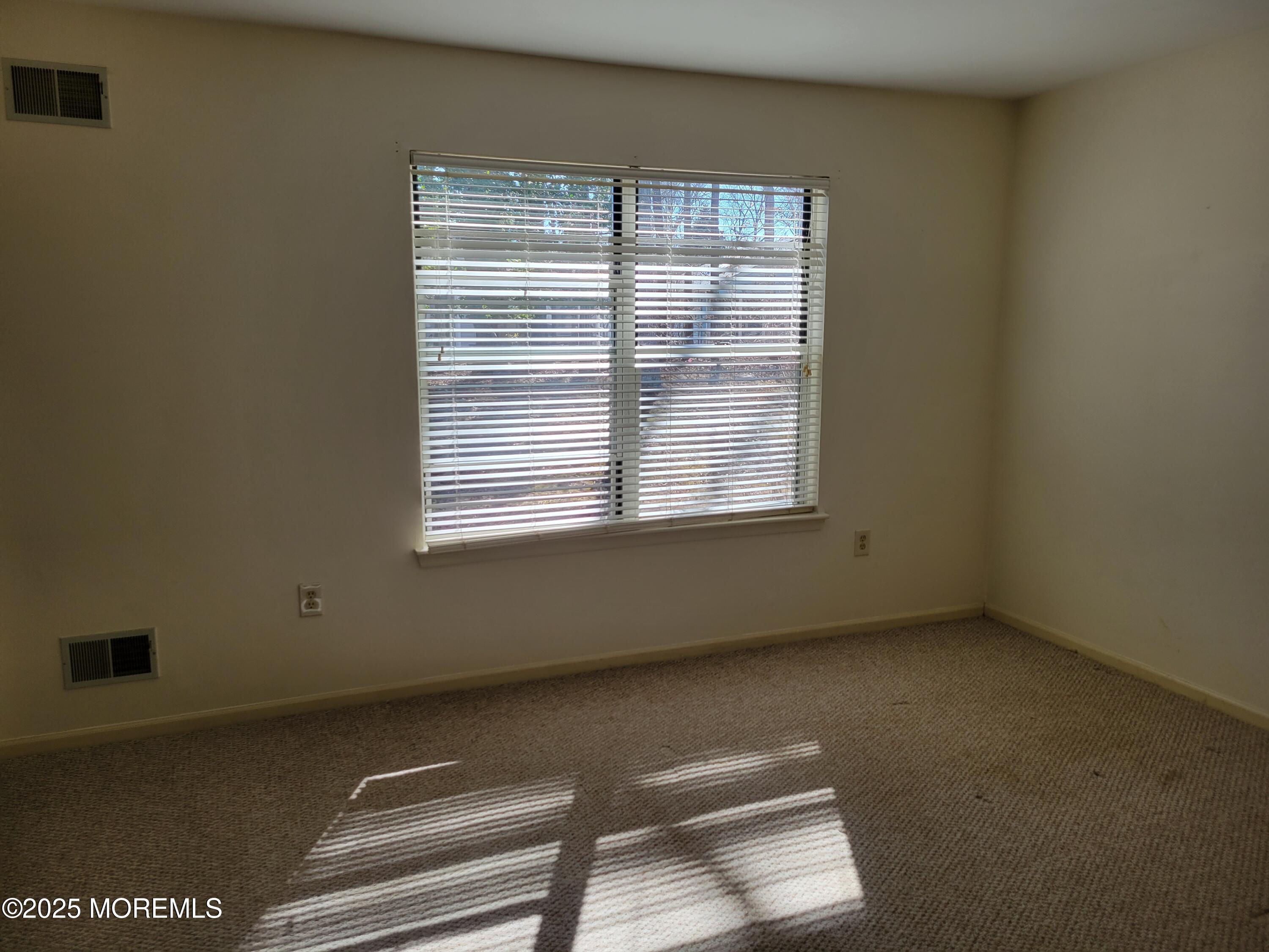 239 Valley Forge Drive Little Egg Harbor, NJ 08087 - Photo 14 of 24 a view of an empty room with a window