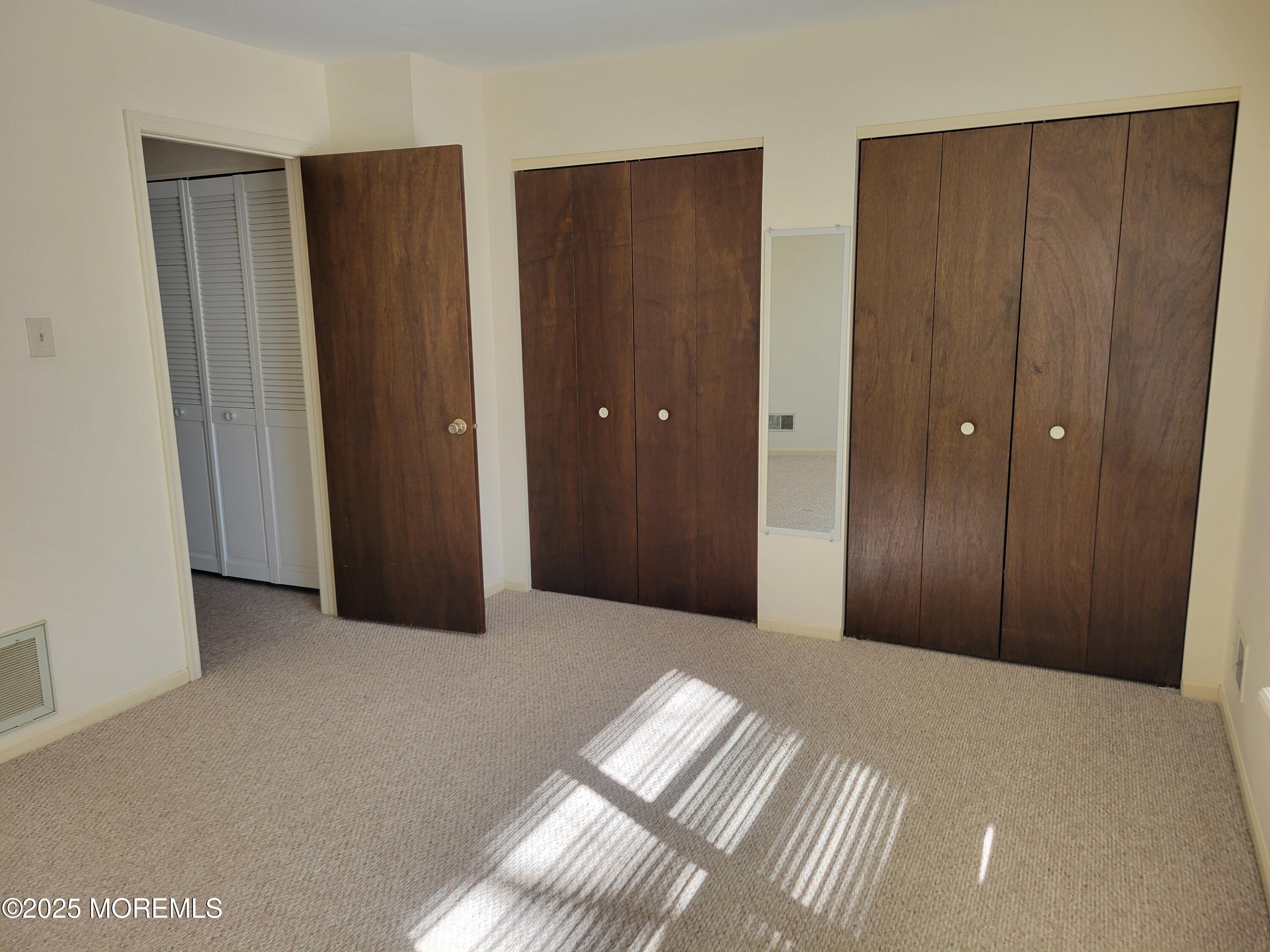 239 Valley Forge Drive Little Egg Harbor, NJ 08087 - Photo 16 of 24 a view of empty room with wooden floor