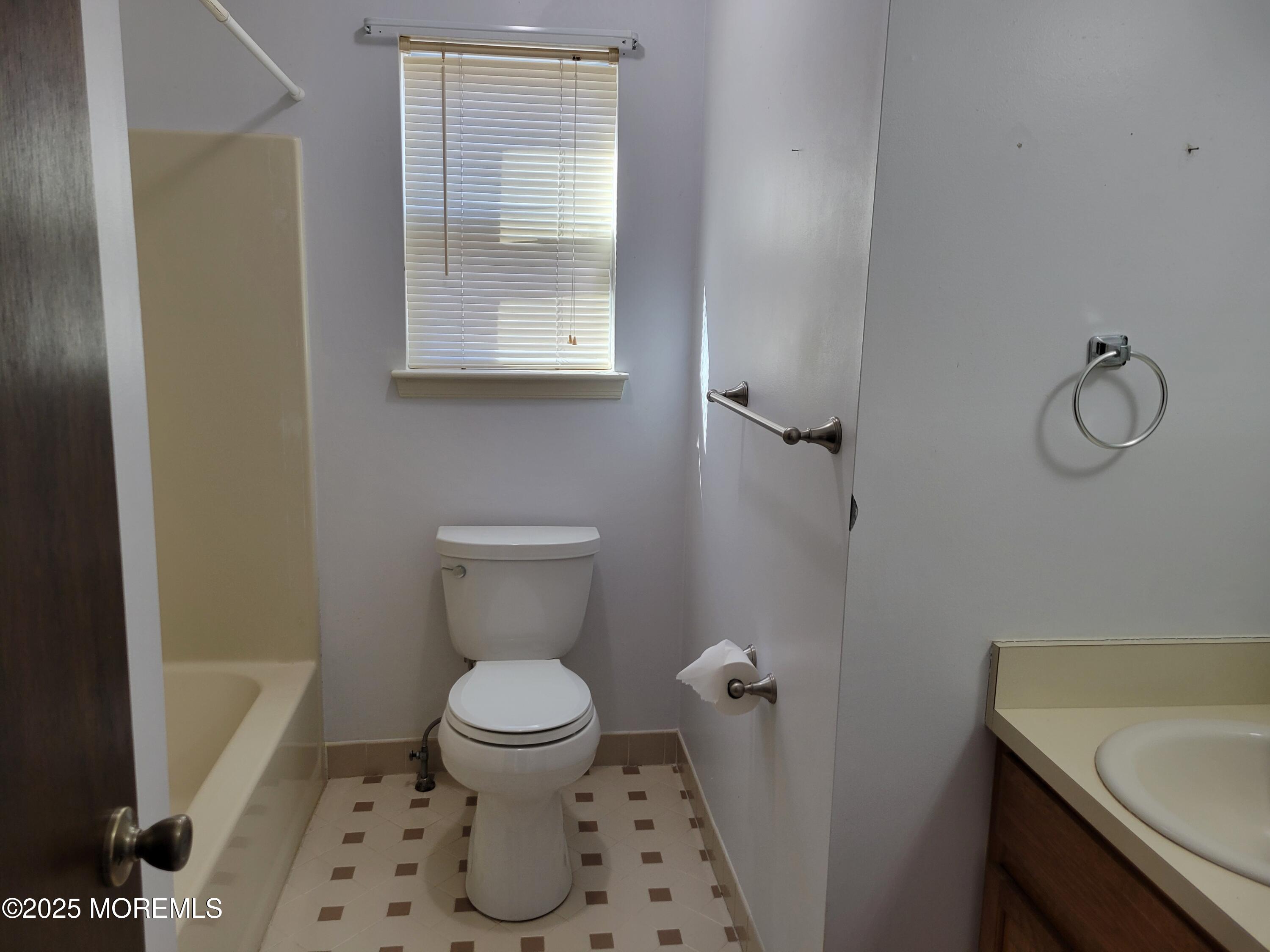 239 Valley Forge Drive Little Egg Harbor, NJ 08087 - Photo 17 of 24 a bathroom with a sink a toilet and a mirror