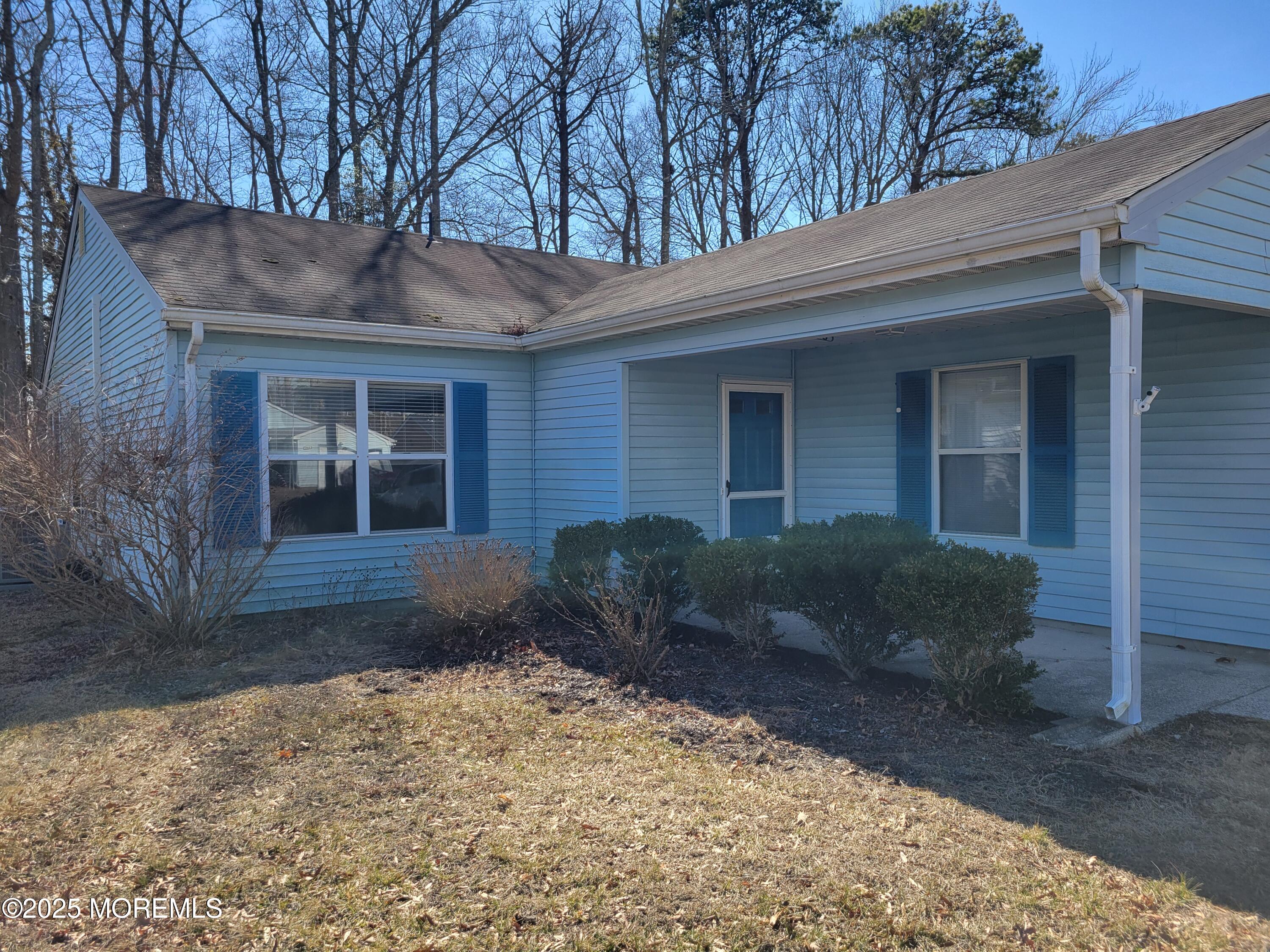 239 Valley Forge Drive Little Egg Harbor, NJ 08087 - Photo 2 of 24 a front view of a house with a yard