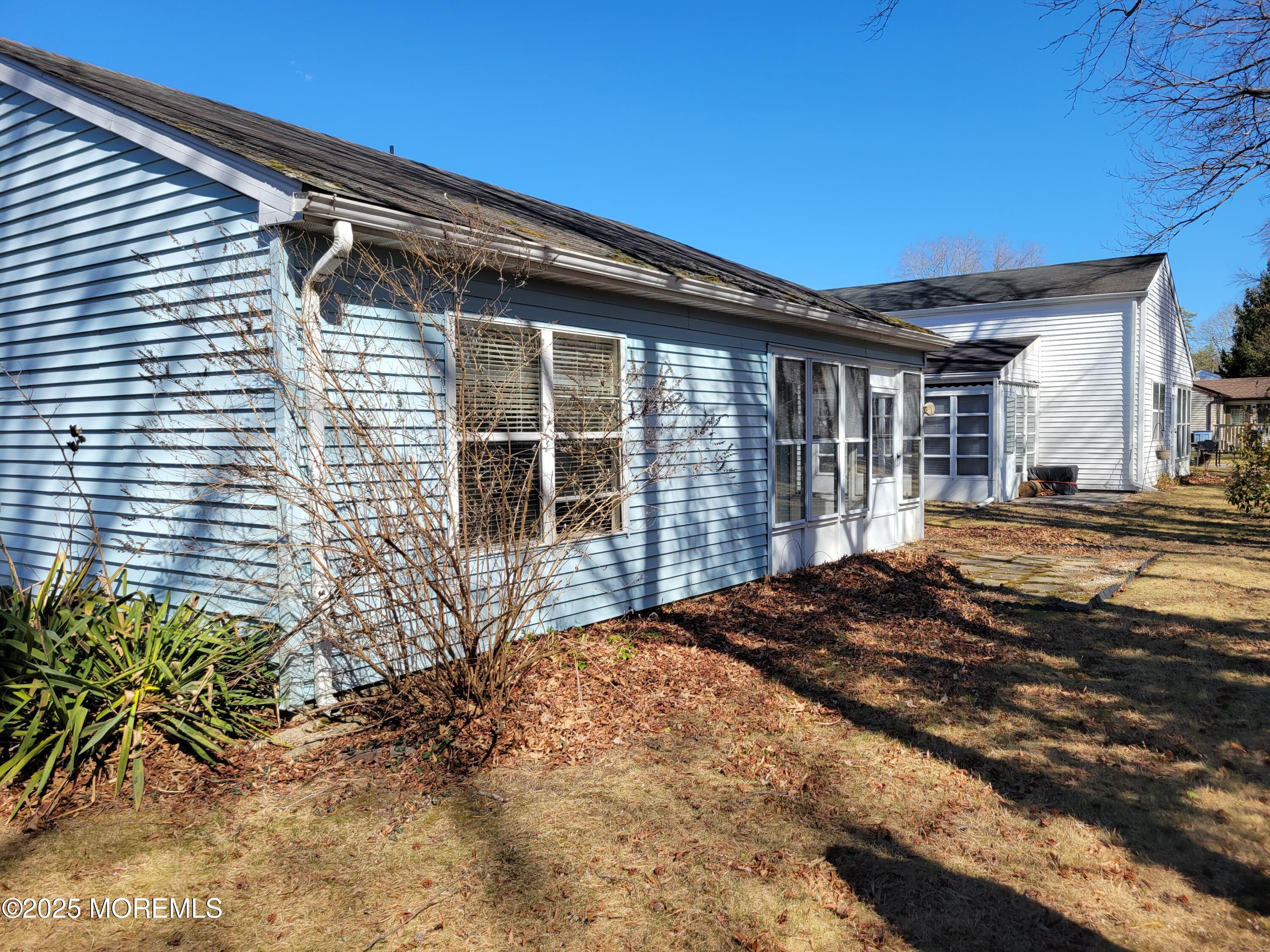 239 Valley Forge Drive Little Egg Harbor, NJ 08087 - Photo 23 of 24 a front view of a house with a yard