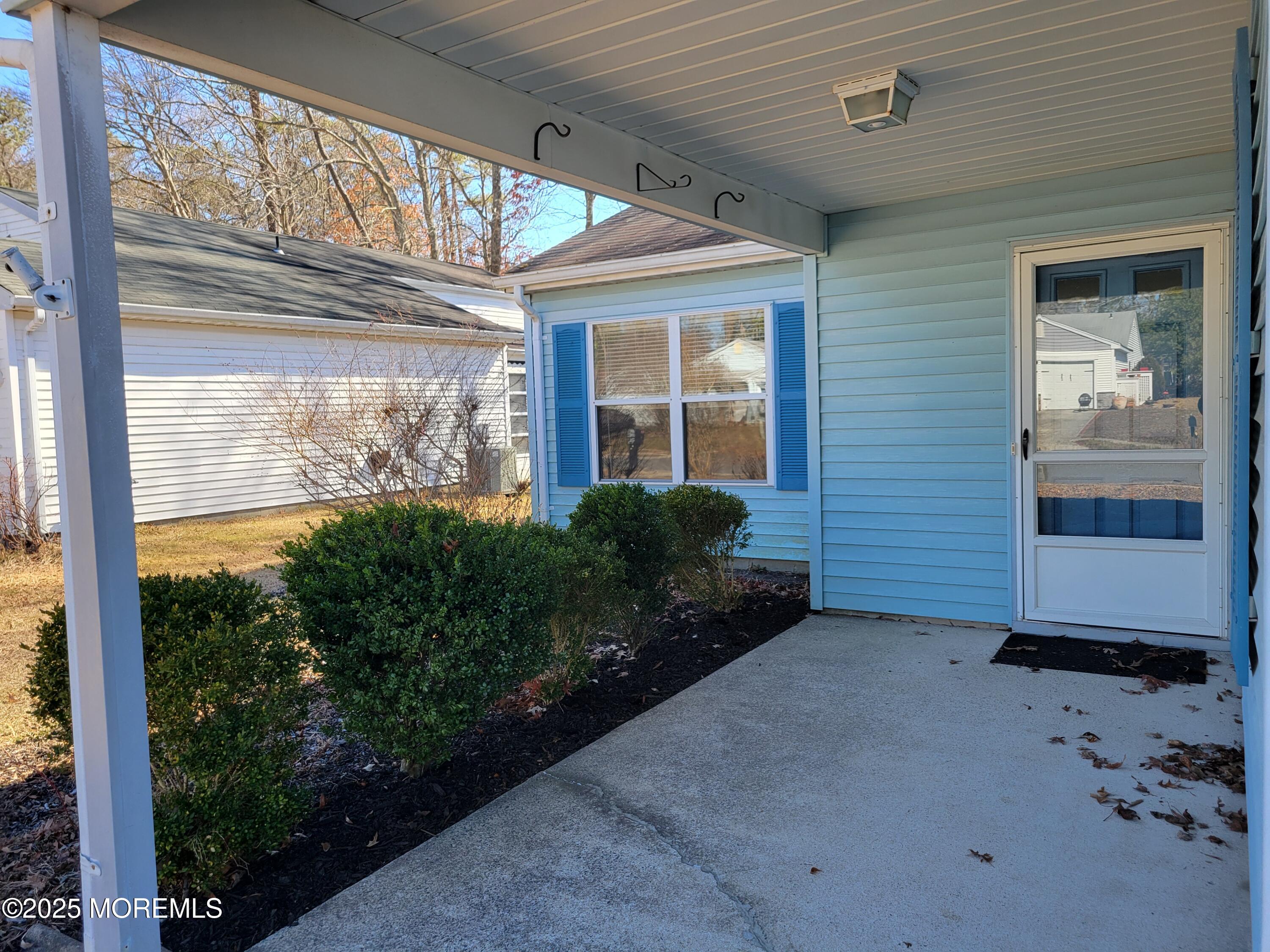 239 Valley Forge Drive Little Egg Harbor, NJ 08087 - Photo 3 of 24 a front view of a house with garden