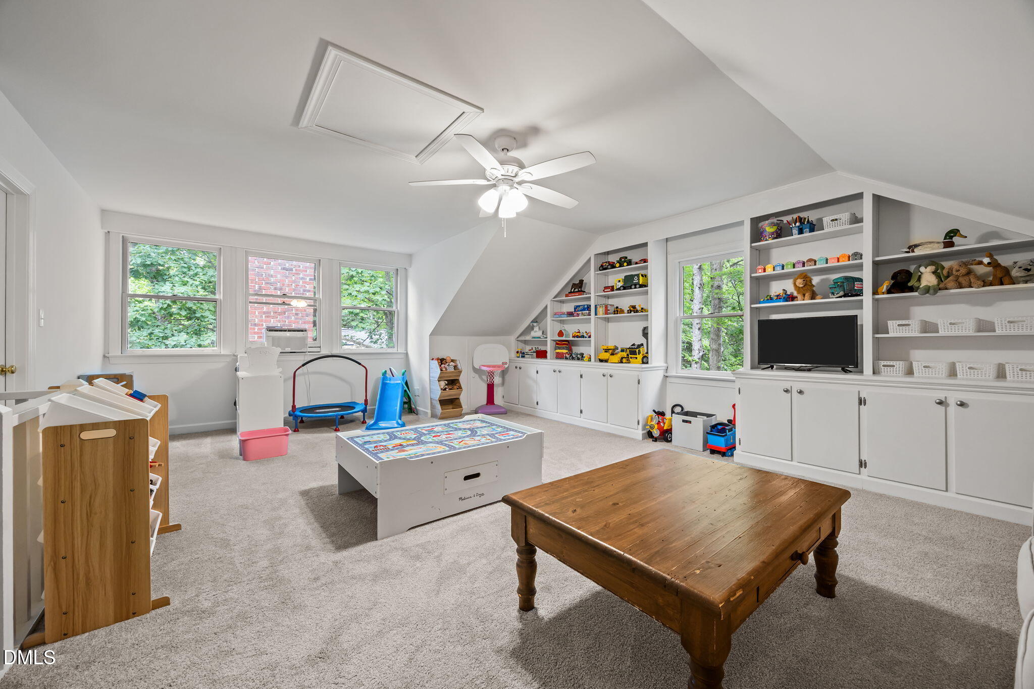 562 Weathergreen Drive Raleigh, NC 27615 - Photo 28 of 47 a bedroom that has a bed window and a table in it