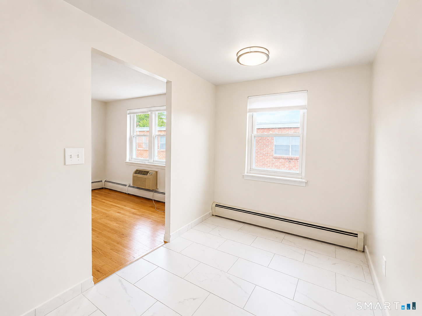 366 Park Road West Hartford, CT 06119 - Photo 2 of 8 a view of an empty room with window