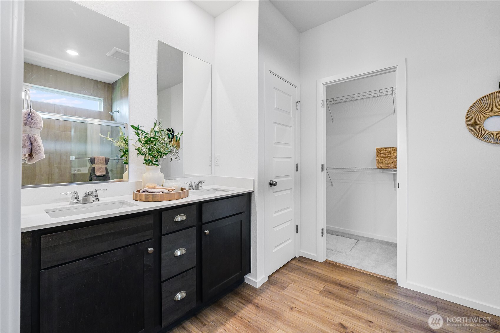 132 Moonshadow Lane Sequim, WA 98382 - Photo 15 of 28 a bathroom with a double vanity sink and mirror