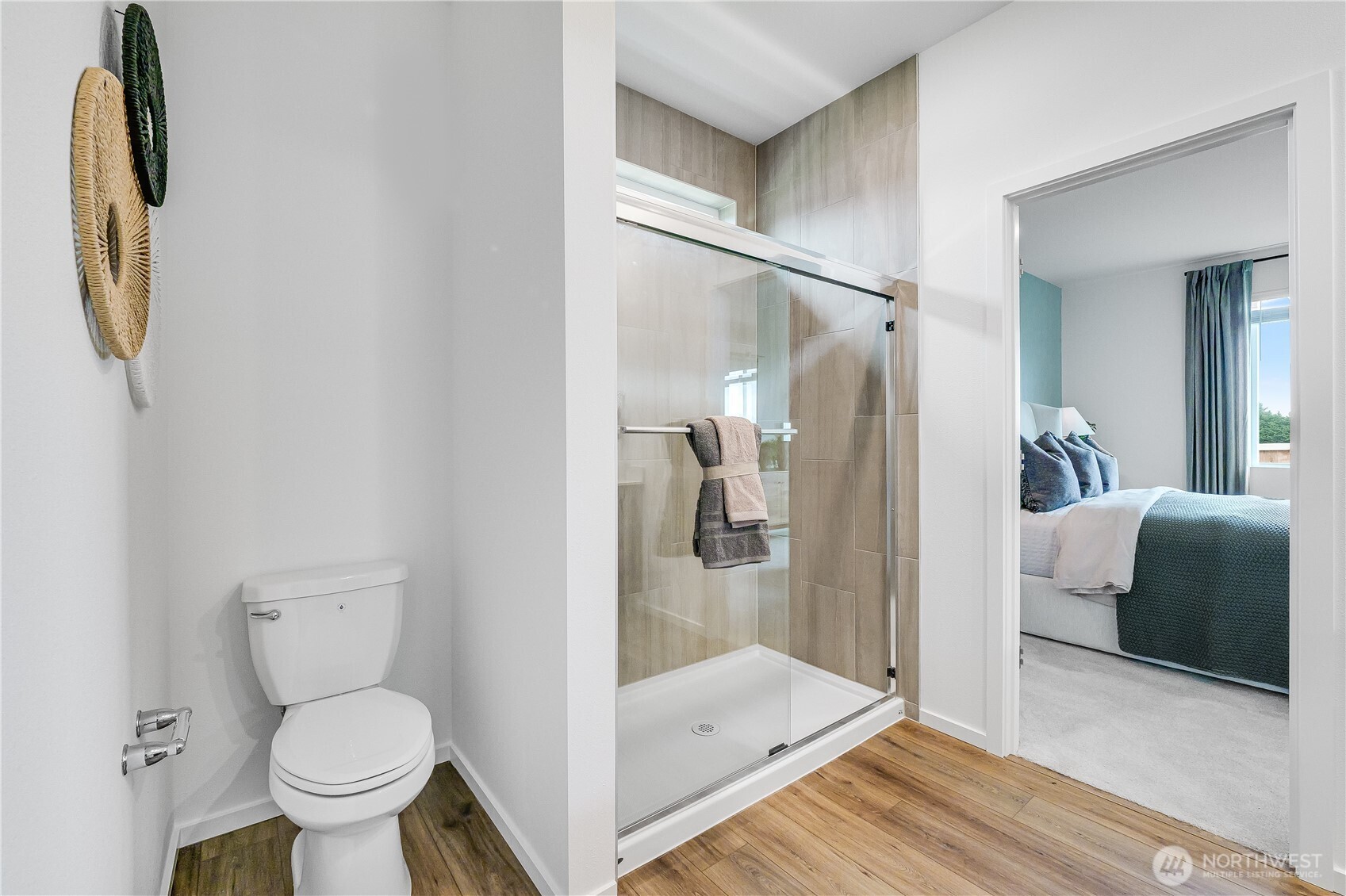 132 Moonshadow Lane Sequim, WA 98382 - Photo 17 of 28 a bathroom with a toilet and a shower