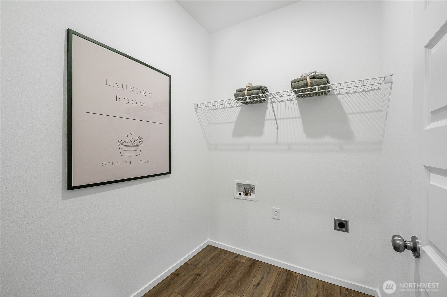 132 Moonshadow Lane Sequim, WA 98382 - Photo 25 of 28 a view of a hallway with wooden floor